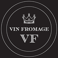 white Vin Fromage logo on black background