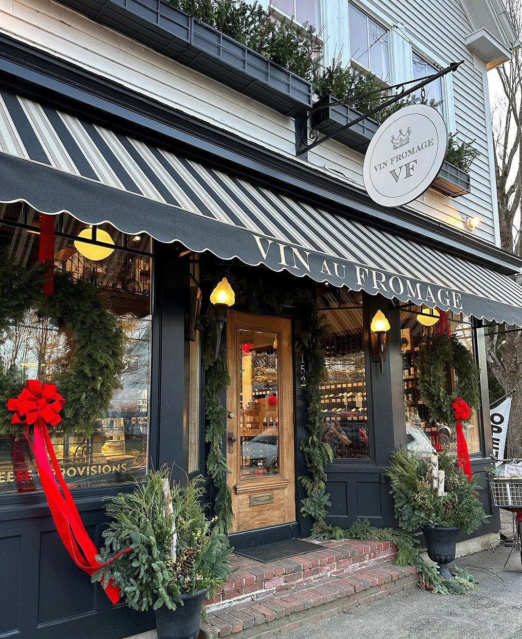 exterior of Vin Fromage while snowing outside